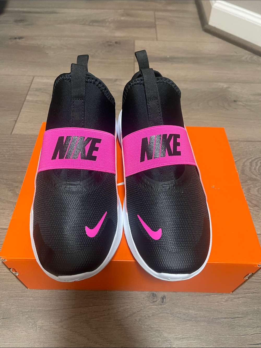 Nike Black Slip-On Sneakers with Hot Pink Accents - Picture 1 of 8
